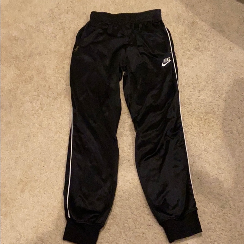 All black with white liner Nike pants